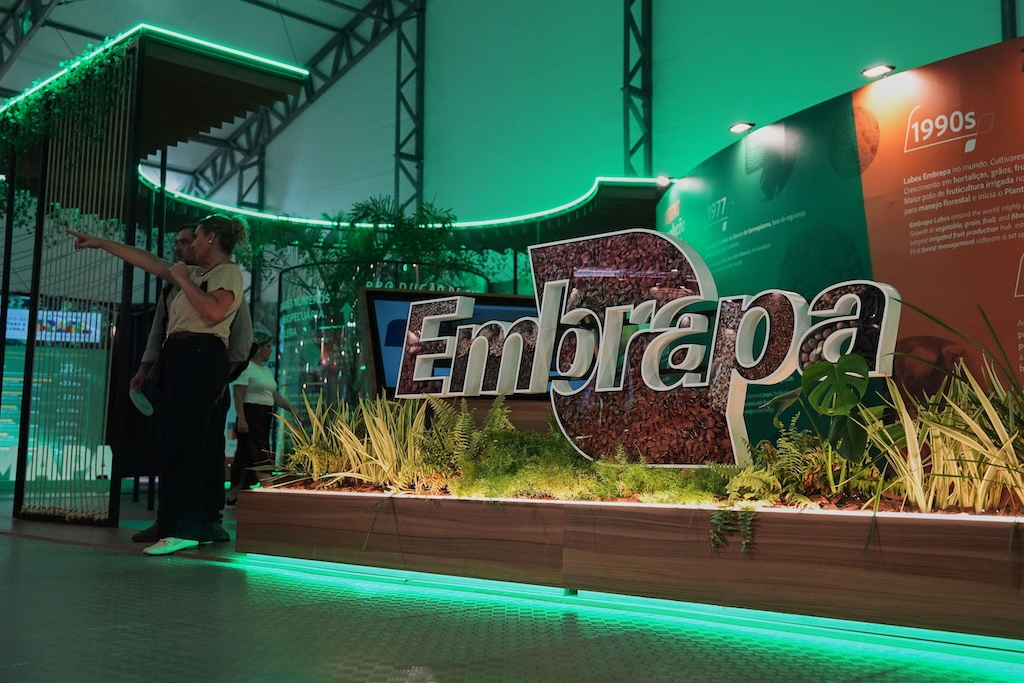 A sign for Embrapa – Brazil’s state-owned firm that is a key player in biofuels research – at the entrance of the COP30 AgriZone. Credit: Associated Press / Alamy Stock Photo