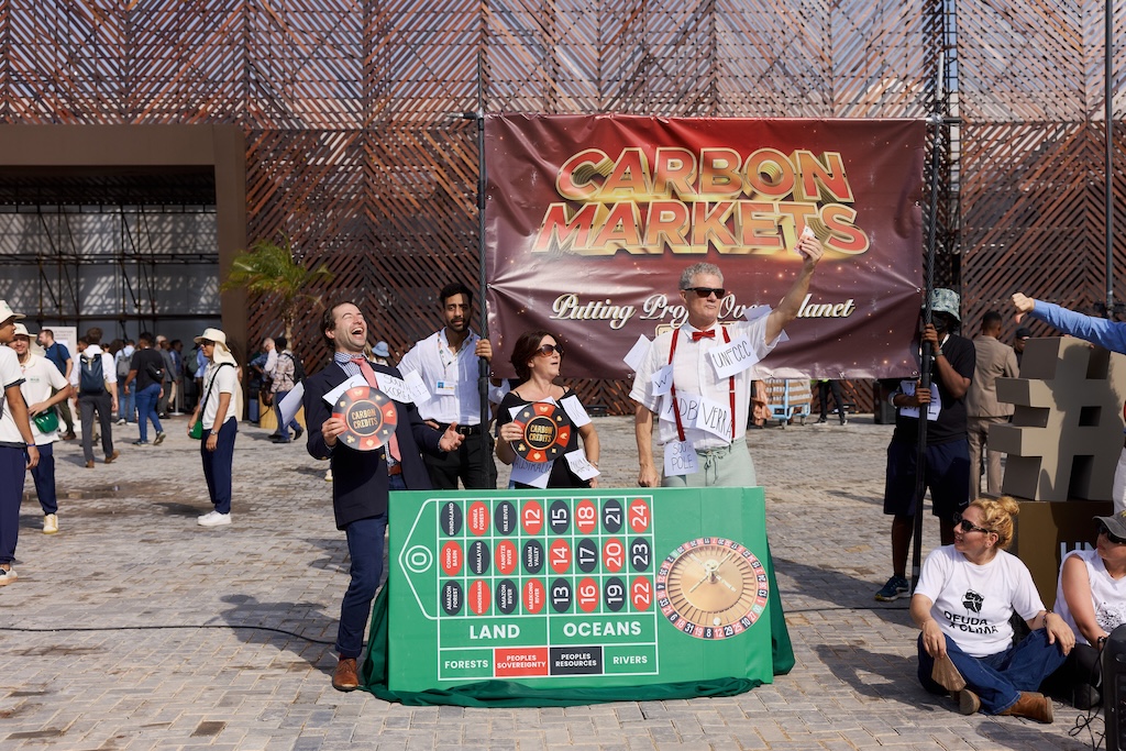 An action outside the COP30 venue on 11 November, resisting what activists called a “carbon casino” at the climate talks. Credit: Bianka Csenki, Artivist Network (2025).