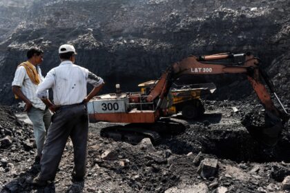 Workers at a coal mine in India.