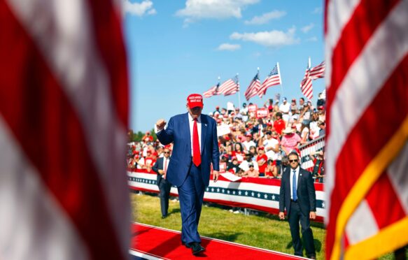 President Donald Trump walks off the stage after speaking at a campaign event on 18 June 2024.