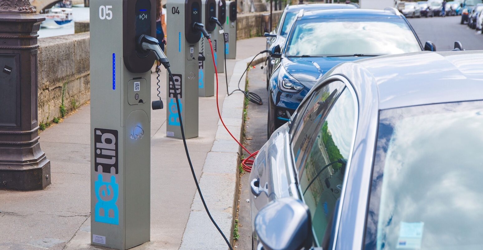 Charging stations for electric vehicles in Paris, France. Credit: Photononstop. Image ID: 2Y6MHE0