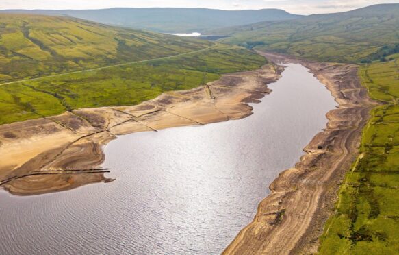 Low water levels in Scar House Reservoir during the 2025 heatwave and drought, UK.