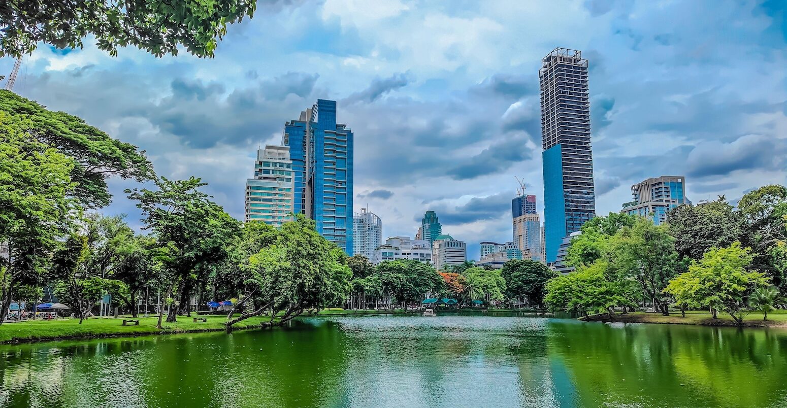 Bangkok skyline from Lumphini Park, Thailand.