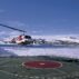 Helicopter landing on icebreaker deck near US scientific research base on Ross Island, Antarctica. Image ID: A1E4K4