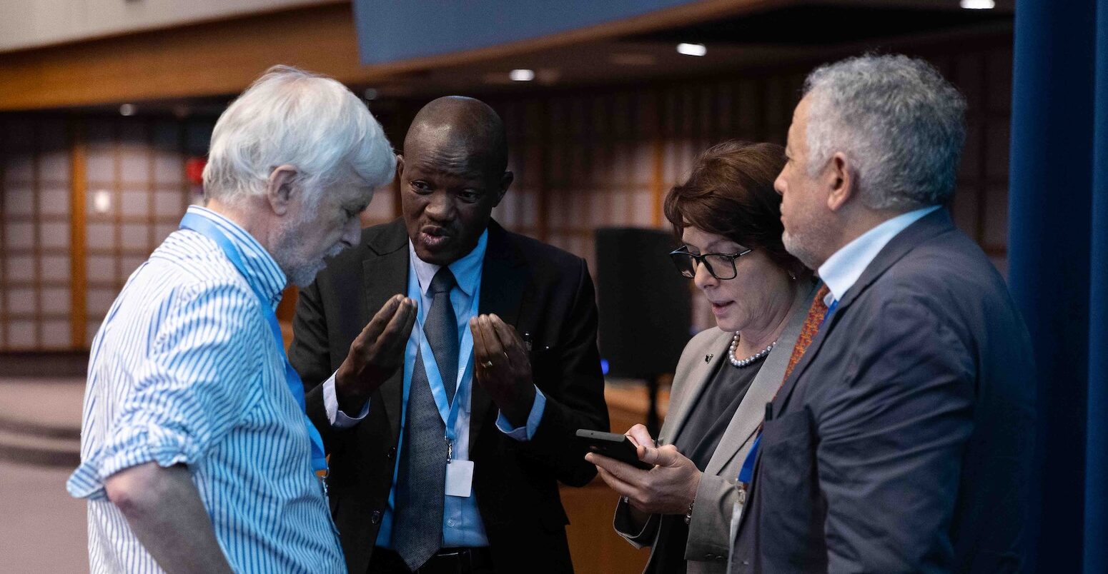 IPCC chair Jim Skea consults with vice-chair Ladislaus Chang'a, deputy secretary Ermira Fida and secretary Abdalah Mokssit