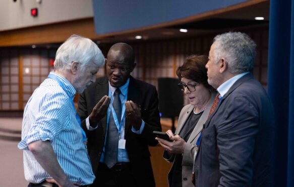 IPCC chair Jim Skea consults with vice-chair Ladislaus Chang'a, deputy secretary Ermira Fida and secretary Abdalah Mokssit