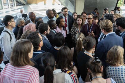Delegates huddle in Bonn on 18 June 2026