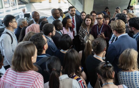 Delegates huddle in Bonn on 18 June 2026