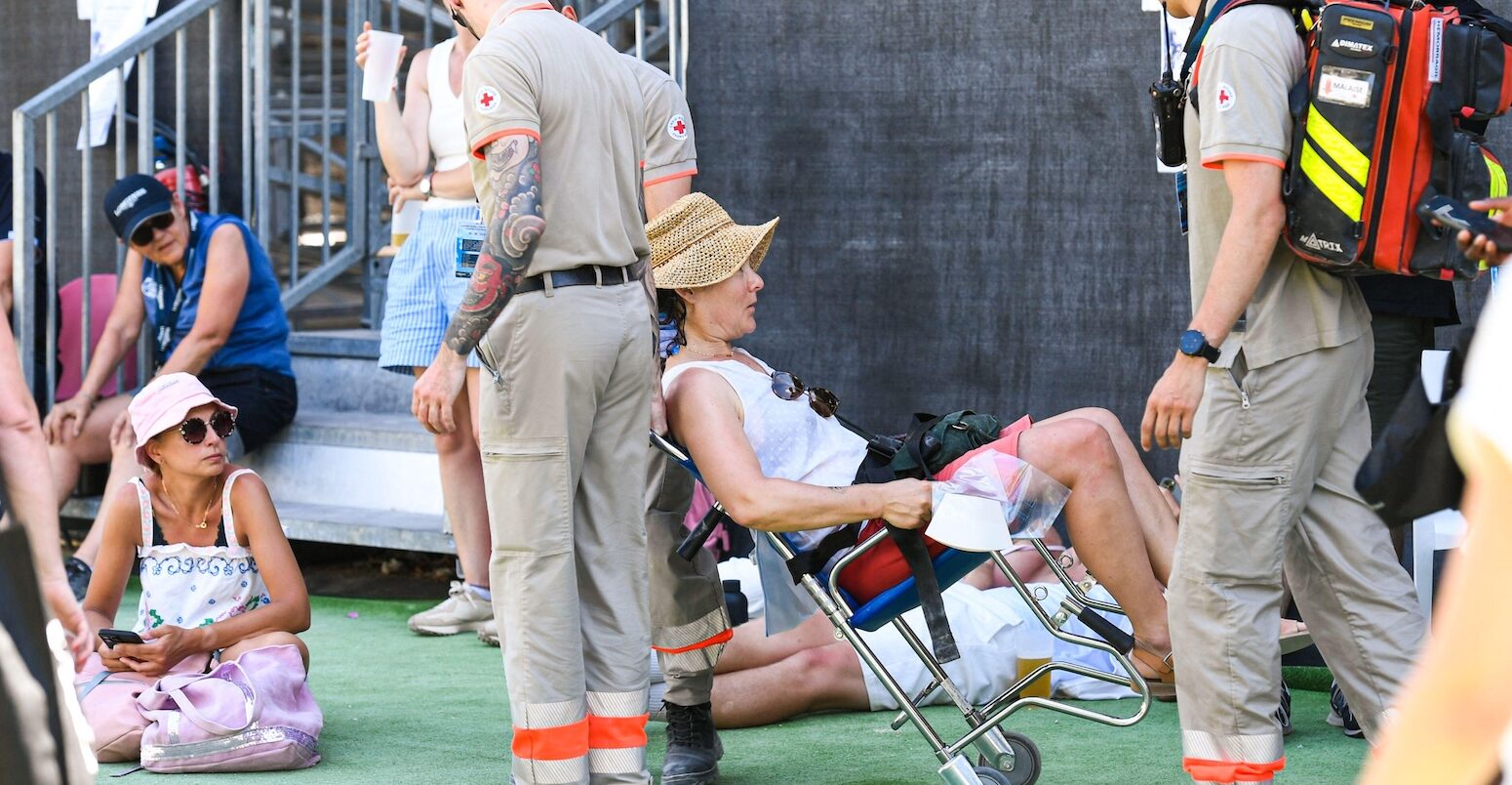 First responders tending to person with heatstroke in Paris on 21 June, 2026.