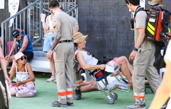 First responders tending to person with heatstroke in Paris on 21 June, 2026.
