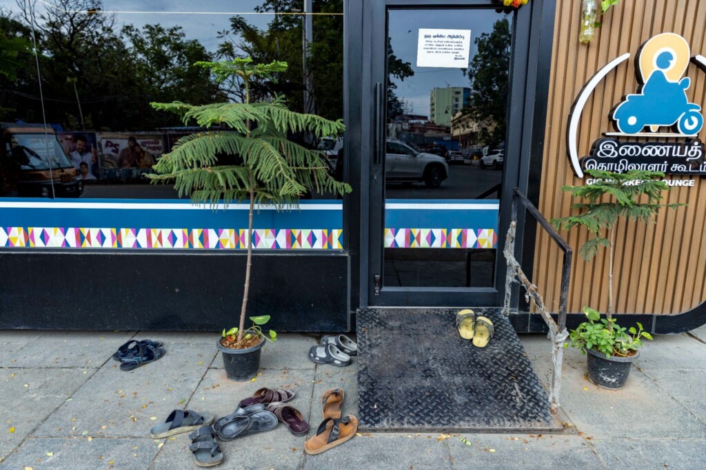 Gig workers leave their slippers outside the lounge.