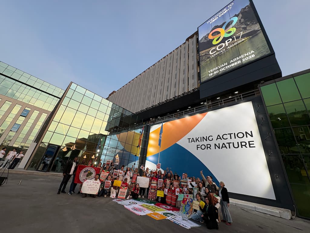 Brazilian Indigenous groups and supporters rallied outside the COP venue on 21 October, ahead of the Brazilian election.